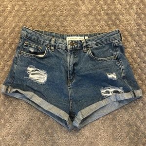 Subdued High Rise Jean Shorts